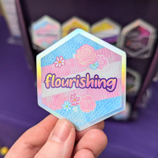 Trans Flourishing - Holographic Hexagon Sticker