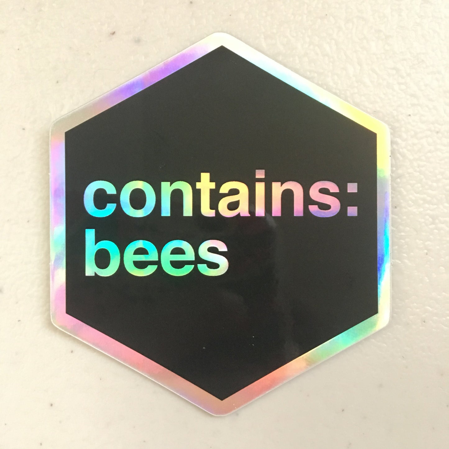 Contains Bees - Holographic Hexagon Sticker